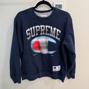 Supreme x Champion Navy Crewneck Sweatshirt with Metallic Logo and Red Accent